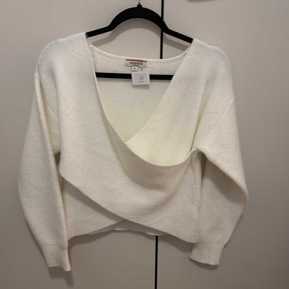 Cross sweater